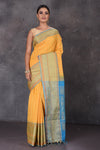Buy beautiful yellow Kanchipuram cotton saree online in USA with blue zari border. Flaunt your ethnic style on special occasions with latest designer sarees, pure silk sarees, handwoven sarees, Kanchipuram silk sarees, embroidered sarees, georgette sarees from Pure Elegance Indian saree store in USA.-full view