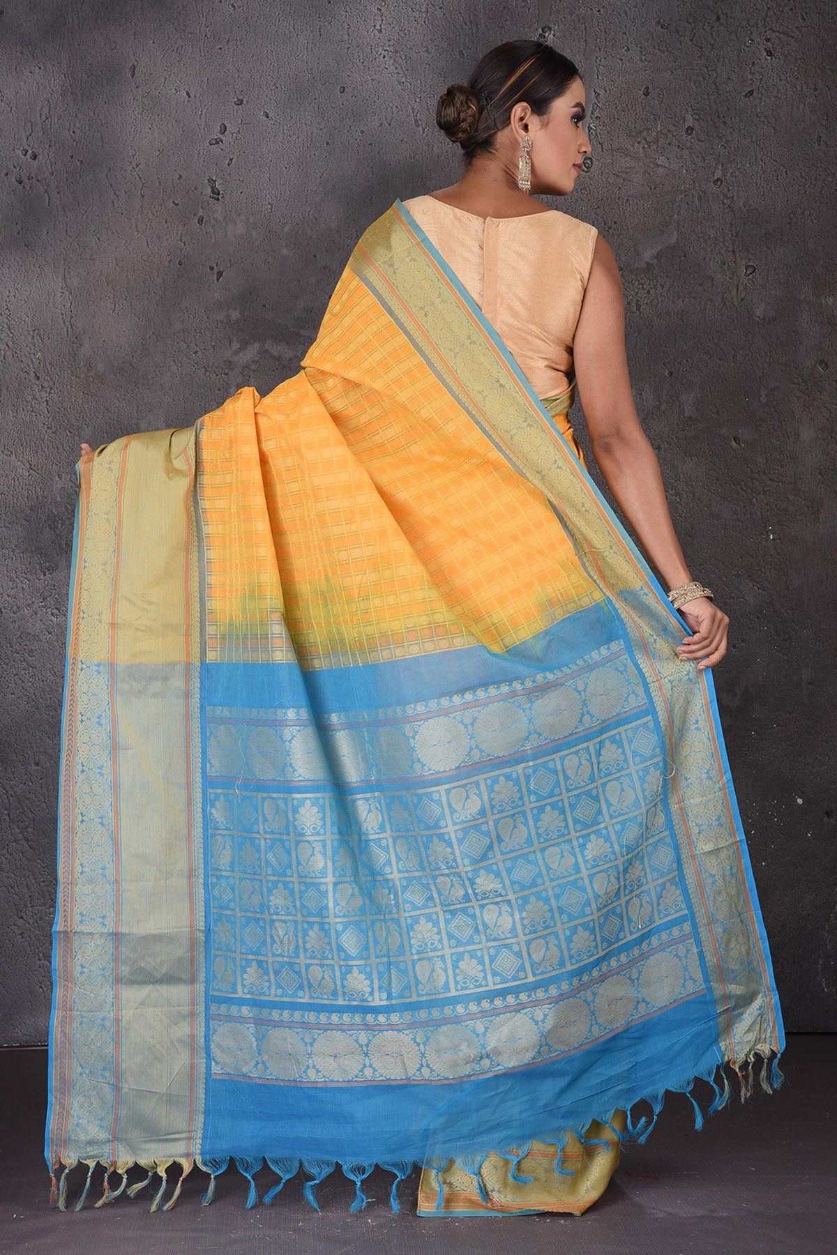 Buy beautiful yellow Kanchipuram cotton saree online in USA with blue zari border. Flaunt your ethnic style on special occasions with latest designer sarees, pure silk sarees, handwoven sarees, Kanchipuram silk sarees, embroidered sarees, georgette sarees from Pure Elegance Indian saree store in USA.-back