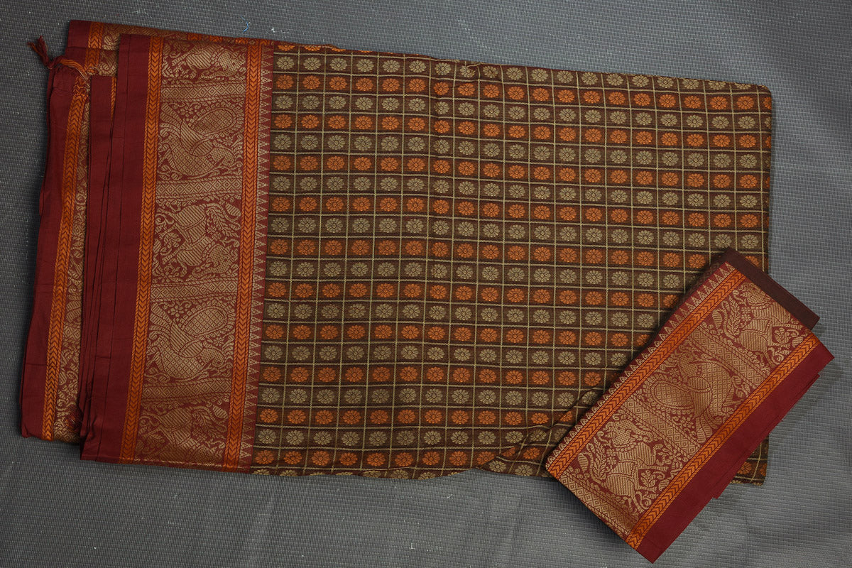 Shop stunning brown Kanchipuram cotton sari online in USA with red orange zari border. Flaunt your ethnic style on special occasions with latest designer sarees, pure silk sarees, handwoven sarees, Kanchipuram silk sarees, embroidered sarees, georgette sarees from Pure Elegance Indian saree store in USA.-blouse