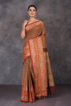 Shop stunning brown Kanchipuram cotton sari online in USA with red orange zari border. Flaunt your ethnic style on special occasions with latest designer sarees, pure silk sarees, handwoven sarees, Kanchipuram silk sarees, embroidered sarees, georgette sarees from Pure Elegance Indian saree store in USA.-full view