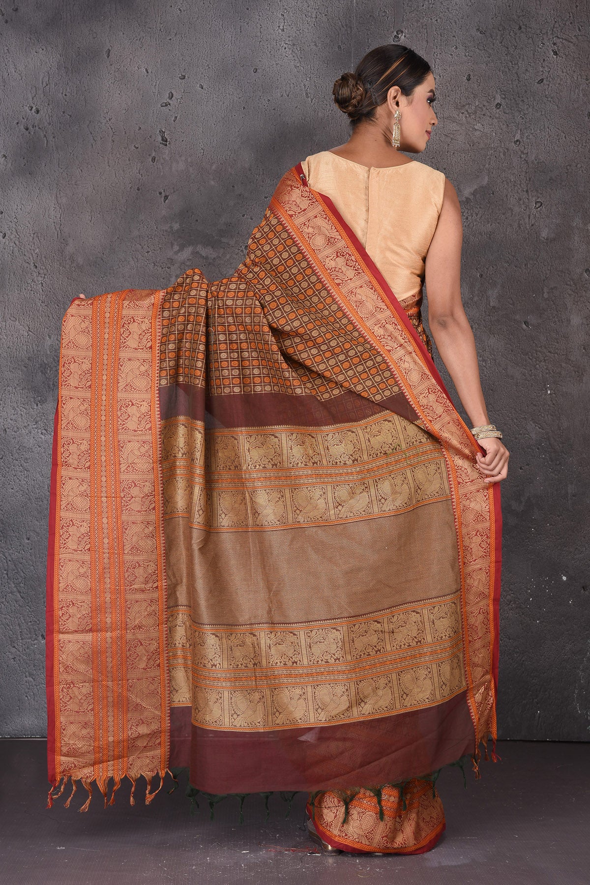 Shop stunning brown Kanchipuram cotton sari online in USA with red orange zari border. Flaunt your ethnic style on special occasions with latest designer sarees, pure silk sarees, handwoven sarees, Kanchipuram silk sarees, embroidered sarees, georgette sarees from Pure Elegance Indian saree store in USA.-back