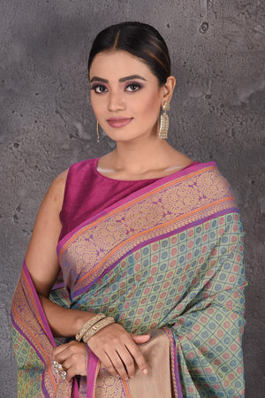 Shop beautiful pastel green Kanchipuram cotton sari online in USA with pink zari border. Flaunt your ethnic style on special occasions with latest designer sarees, pure silk sarees, handwoven sarees, Kanchipuram silk sarees, embroidered sarees, georgette sarees from Pure Elegance Indian saree store in USA.-closeup