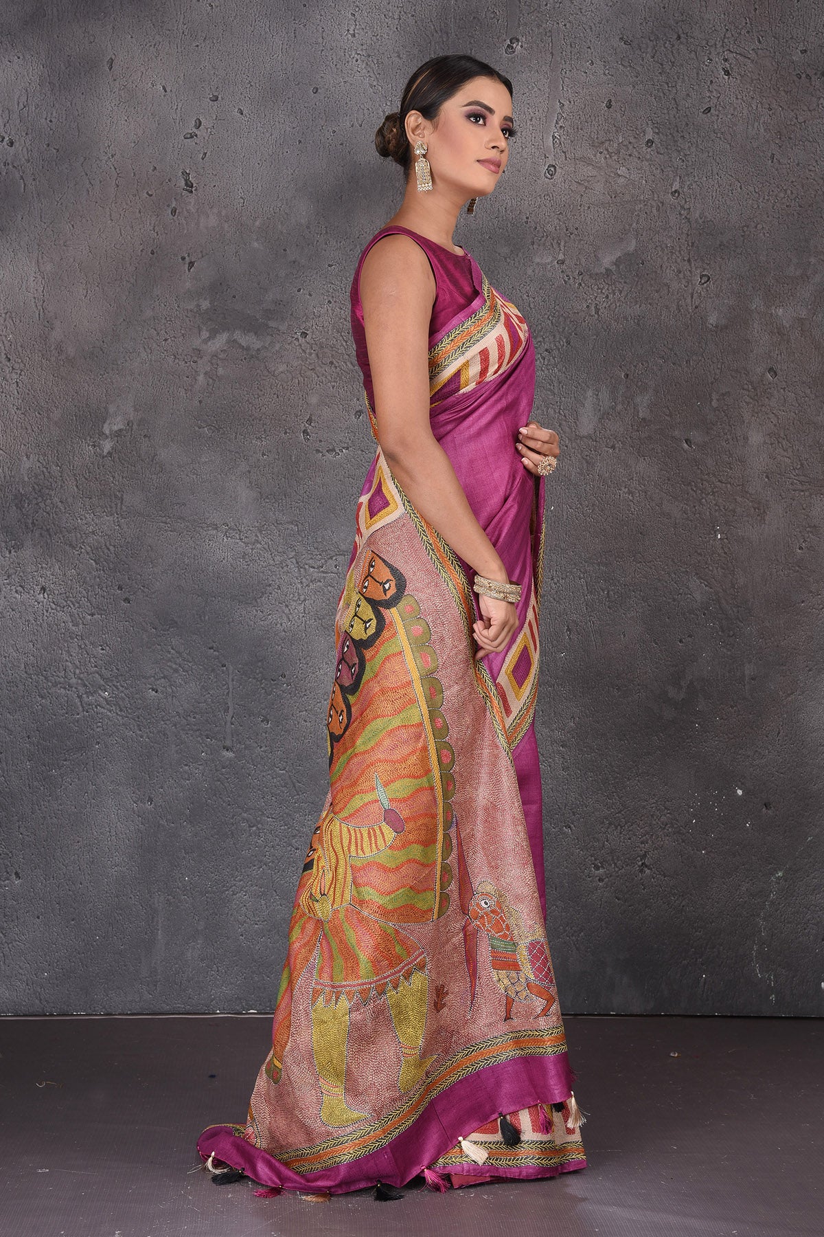 Buy stunning purple Kantha work tussar silk sari online in USA. Flaunt your ethnic style on special occasions with latest designer sarees, pure silk sarees, handwoven sarees, Kanchipuram silk sarees, embroidered sarees, georgette sarees from Pure Elegance Indian saree store in USA.-side