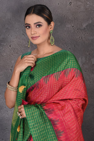 Buy beautiful pink zari check Gadhwal silk sari online in USA with pink temple border. Flaunt your ethnic style on special occasions with latest designer sarees, pure silk sarees, handwoven sarees, Kanchipuram silk sarees, embroidered sarees, georgette sarees, party sarees from Pure Elegance Indian saree store in USA.-closeup