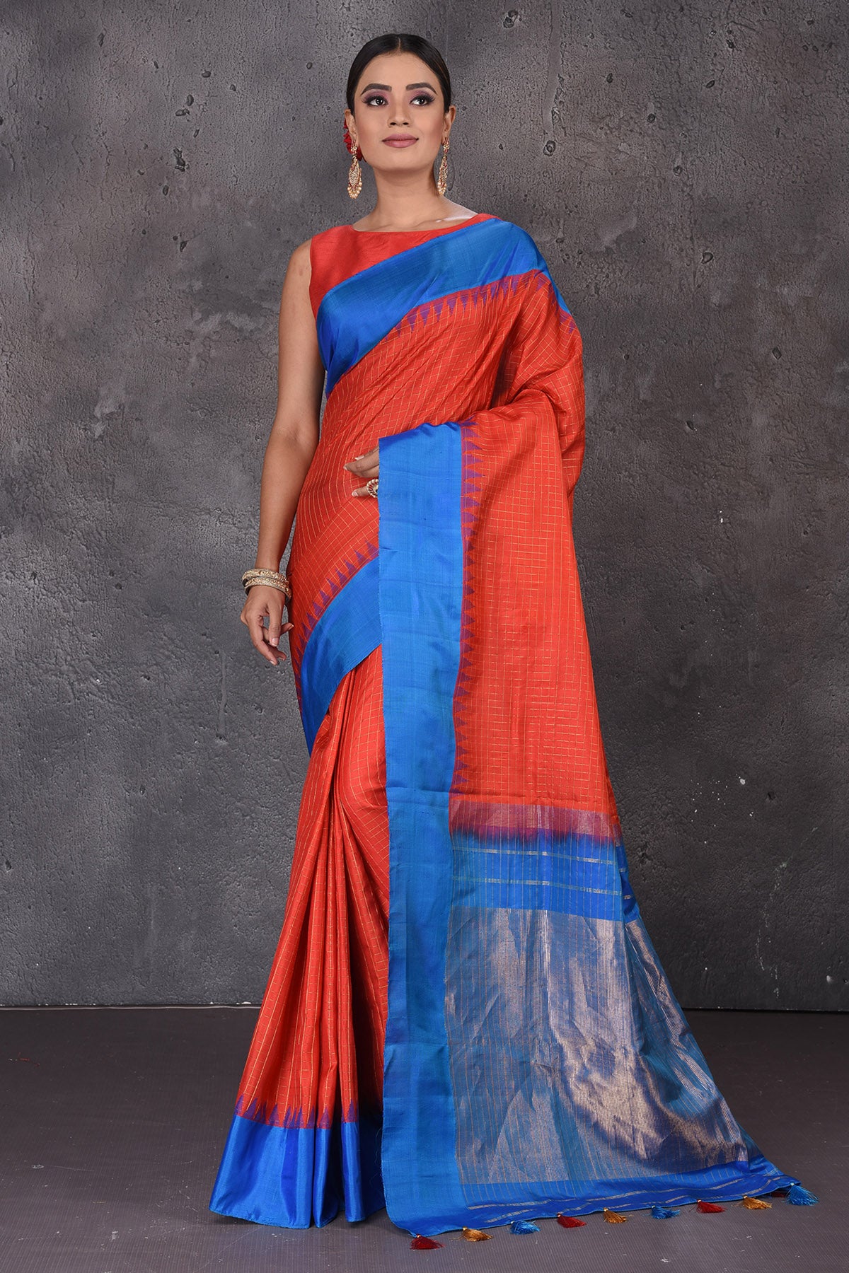 Buy stunning red zari check Gadhwal silk saree online in USA with blue temple border. Flaunt your ethnic style on special occasions with latest designer sarees, pure silk sarees, handwoven sarees, Kanchipuram silk sarees, embroidered sarees, georgette sarees, party sarees from Pure Elegance Indian saree store in USA.-full view