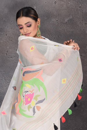 Shop stunning white resham Jamdani saree online in USA. Flaunt your ethnic style on special occasions with latest designer sarees, pure silk sarees, handwoven sarees, Kanchipuram silk sarees, embroidered sarees, georgette sarees, party sarees from Pure Elegance Indian saree store in USA.-closeup