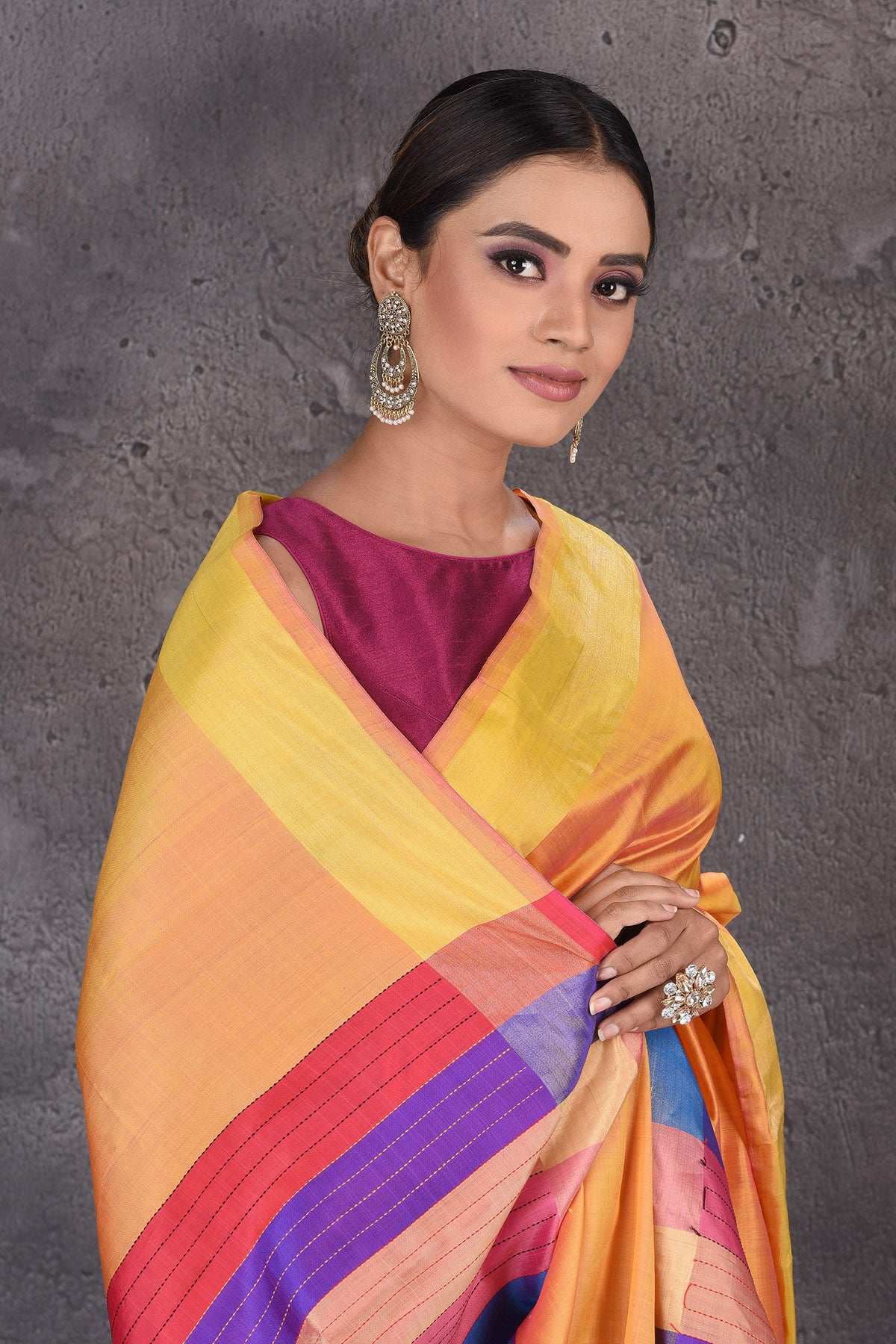 Buy beautiful yellow Bishnupur silk sari online in USA with pink and purple stripes pallu. Flaunt your ethnic style on special occasions with latest designer sarees, pure silk sarees, handwoven sarees, Kanchipuram silk sarees, embroidered sarees, georgette sarees, party sarees from Pure Elegance Indian saree store in USA.-closeup