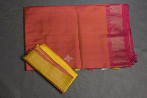 Shop beautiful orange Bishnupur silk saree online in USA with pink zari border. Flaunt your ethnic style on special occasions with latest designer sarees, pure silk sarees, handwoven sarees, Kanchipuram silk sarees, embroidered sarees, georgette sarees, party sarees from Pure Elegance Indian saree store in USA.-blouse