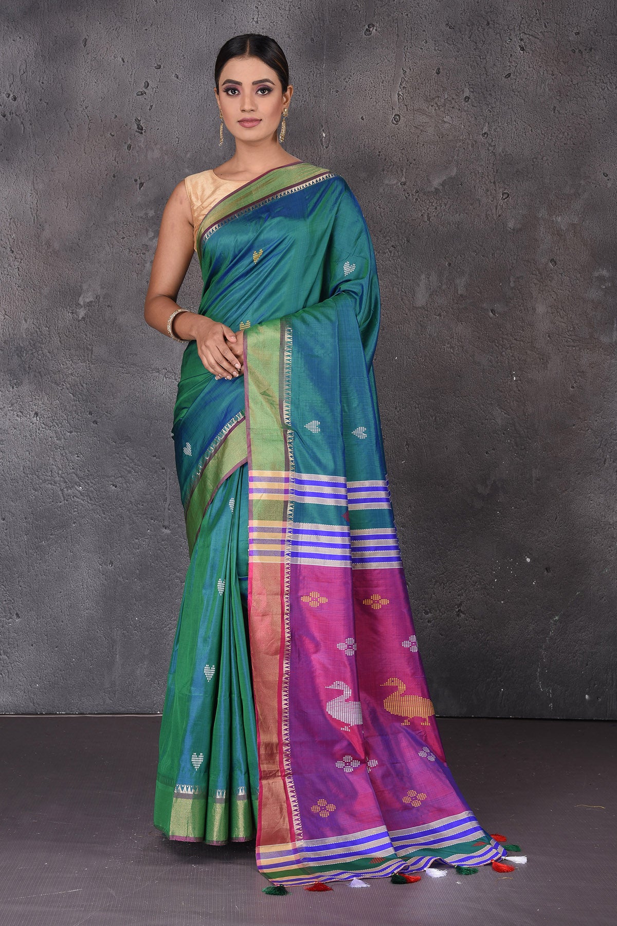 Shop stunning green Bishnupur silk sari online in USA with purple zari pallu. Flaunt your ethnic style on special occasions with latest designer sarees, pure silk sarees, handwoven sarees, Kanchipuram silk sarees, embroidered sarees, georgette sarees, party sarees from Pure Elegance Indian saree store in USA.-full view