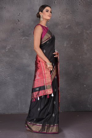 Buy beautiful black Bishnupur silk sari online in USA with red zari pallu. Flaunt your ethnic style on special occasions with latest designer sarees, pure silk sarees, handwoven sarees, Kanchipuram silk sarees, embroidered sarees, georgette sarees, party sarees from Pure Elegance Indian saree store in USA.-side