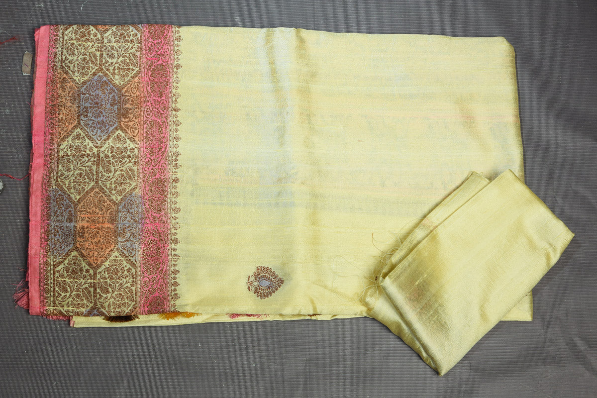 Buy stunning light yellow dupion silk saree online in USA with antique zari border. Flaunt your ethnic style on special occasions with latest designer sarees, pure silk sarees, handwoven sarees, Kanchipuram silk sarees, embroidered sarees, georgette sarees, party sarees from Pure Elegance Indian saree store in USA.-blouse
