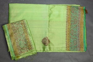 Buy beautiful pastel green dupion silk sari online in USA with antique zari border. Flaunt your ethnic style on special occasions with latest designer sarees, pure silk sarees, handwoven sarees, Kanchipuram silk sarees, embroidered sarees, georgette sarees, party sarees from Pure Elegance Indian saree store in USA.-blouse