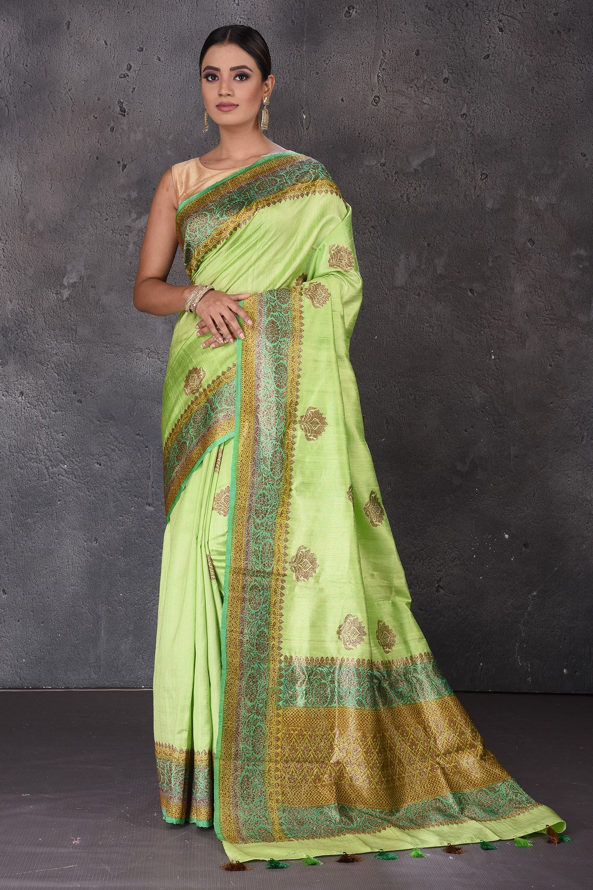 Buy beautiful pastel green dupion silk sari online in USA with antique zari border. Flaunt your ethnic style on special occasions with latest designer sarees, pure silk sarees, handwoven sarees, Kanchipuram silk sarees, embroidered sarees, georgette sarees, party sarees from Pure Elegance Indian saree store in USA.-full view