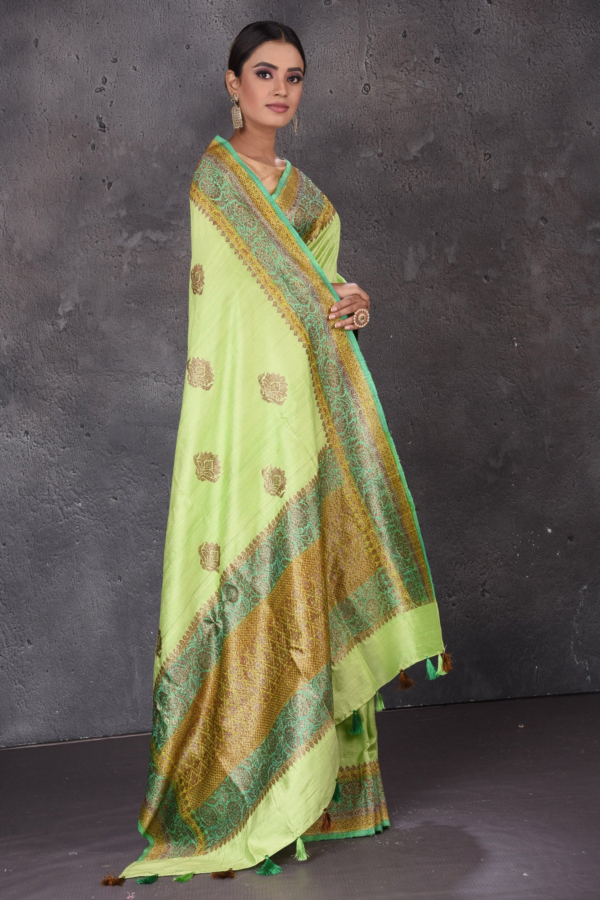 Buy beautiful pastel green dupion silk sari online in USA with antique zari border. Flaunt your ethnic style on special occasions with latest designer sarees, pure silk sarees, handwoven sarees, Kanchipuram silk sarees, embroidered sarees, georgette sarees, party sarees from Pure Elegance Indian saree store in USA.-side