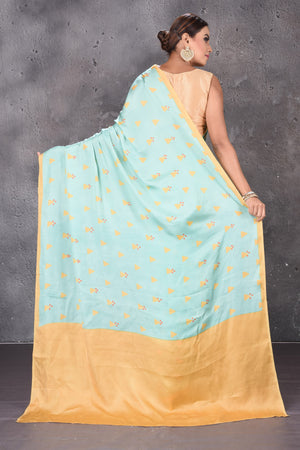 Shop stunning pastel green modal silk saree online in USA with printed buta. Keep your ethnic wardrobe up to date with latest designer sarees, pure silk sarees, handwoven sarees, tussar silk sarees, embroidered sarees from Pure Elegance Indian saree store in USA.-back