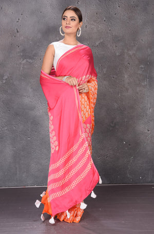 Shop gorgeous pink and orange modal silk saree online in USA. Keep your ethnic wardrobe up to date with latest designer sarees, pure silk sarees, handwoven sarees, tussar silk sarees, embroidered sarees from Pure Elegance Indian saree store in USA.-side