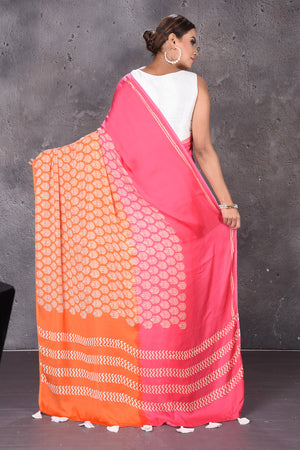 Shop gorgeous pink and orange modal silk saree online in USA. Keep your ethnic wardrobe up to date with latest designer sarees, pure silk sarees, handwoven sarees, tussar silk sarees, embroidered sarees from Pure Elegance Indian saree store in USA.-back