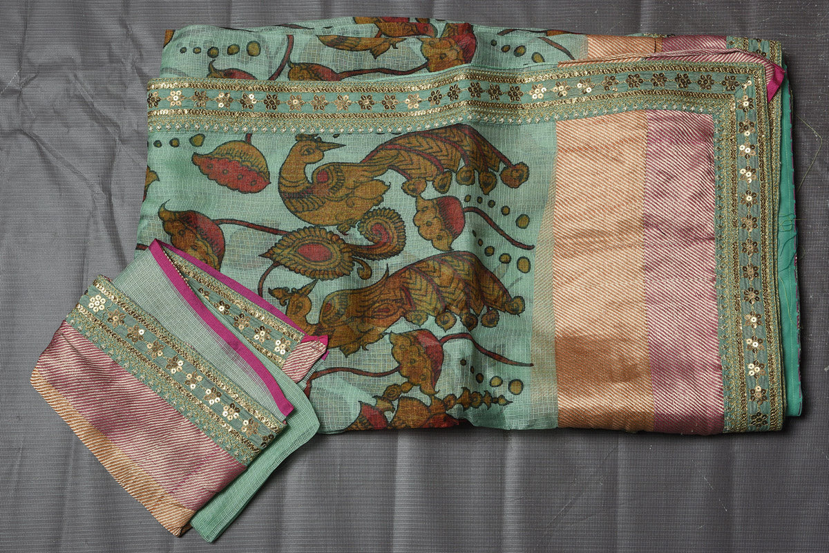 Shop beautiful sage green leaf print Kota silk sari online in USA with embroidered zari border. Keep your ethnic wardrobe up to date with latest designer sarees, pure silk sarees, handwoven sarees, tussar silk sarees, embroidered sarees from Pure Elegance Indian saree store in USA.-blouse