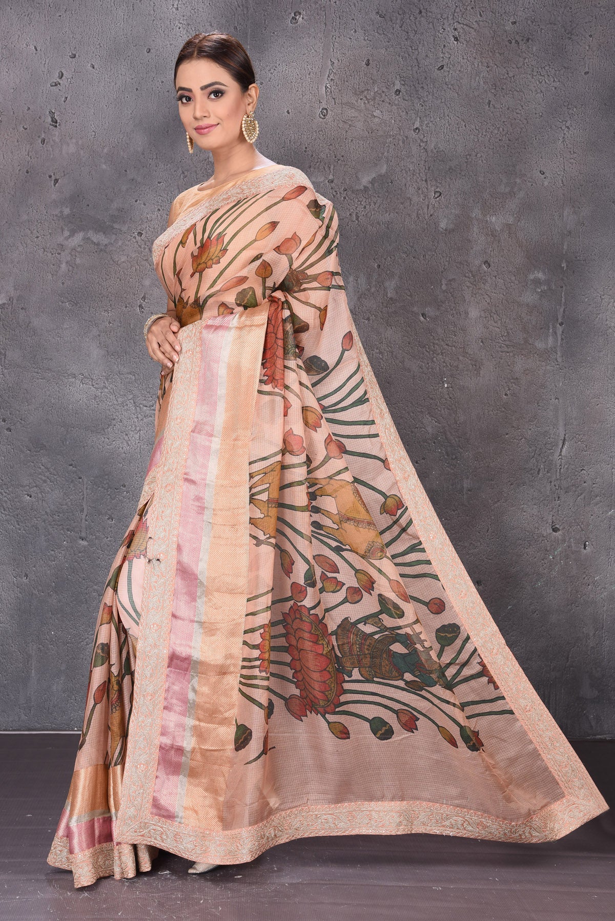 Shop stunning beige printed Kota silk sari online in USA with embroidered zari border. Keep your ethnic wardrobe up to date with latest designer sarees, pure silk sarees, handwoven sarees, tussar silk sarees, embroidered sarees from Pure Elegance Indian saree store in USA.-full view