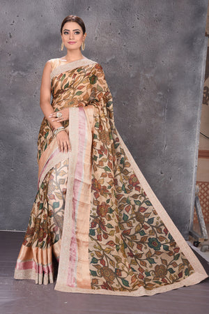 Buy elegant beige printed Kota silk saree online in USA with embroidered zari border. Keep your ethnic wardrobe up to date with latest designer sarees, pure silk sarees, handwoven sarees, tussar silk sarees, embroidered saris from Pure Elegance Indian saree store in USA.-full view