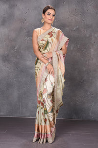 Buy beautiful mint green printed Kota silk sari online in USA with embroidered zari border. Keep your ethnic wardrobe up to date with latest designer sarees, pure silk sarees, handwoven sarees, tussar silk sarees, embroidered sarees from Pure Elegance Indian saree store in USA.-full view