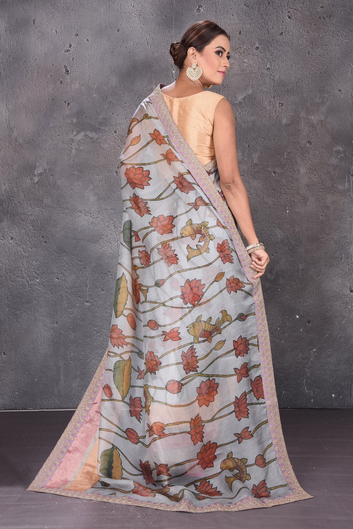 Buy grey printed Kota silk saree online in USA with embroidered zari border. Keep your ethnic wardrobe up to date with latest designer sarees, pure silk sarees, handwoven sarees, tussar silk sarees, embroidered sarees from Pure Elegance Indian saree store in USA.-back
