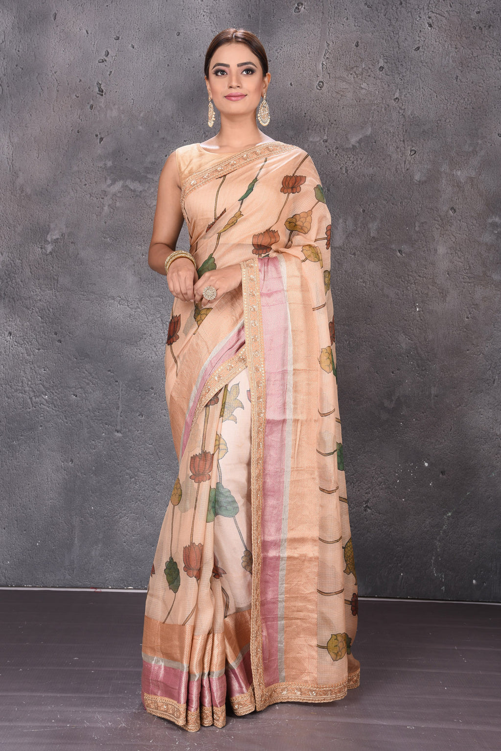 Buy beautiful beige printed Kota silk saree online in USA with embroidered zari border. Keep your ethnic wardrobe up to date with latest designer sarees, pure silk sarees, handwoven sarees, tussar silk sarees, embroidered sarees from Pure Elegance Indian saree store in USA.-full view