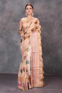 Buy beautiful beige printed Kota silk saree online in USA with embroidered zari border. Keep your ethnic wardrobe up to date with latest designer sarees, pure silk sarees, handwoven sarees, tussar silk sarees, embroidered sarees from Pure Elegance Indian saree store in USA.-full view