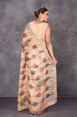 Buy beautiful beige printed Kota silk saree online in USA with embroidered zari border. Keep your ethnic wardrobe up to date with latest designer sarees, pure silk sarees, handwoven sarees, tussar silk sarees, embroidered sarees from Pure Elegance Indian saree store in USA.-back