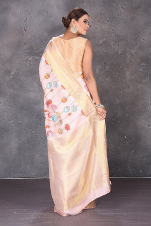 Buy powder pink printed Kanjeevaram silk saree online in USA with zari border. Keep your ethnic wardrobe up to date with latest designer sarees, pure silk sarees, handwoven sarees, tussar silk sarees, embroidered sarees from Pure Elegance Indian saree store in USA.-back