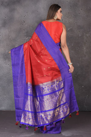 Buy stunning red Gadhwal silk saree online in USA with blue border and buta. Enrich your ethnic wardrobe with traditional Indian sarees, designer sarees. embroidered sarees, pure silk sarees, handwoven sarees, Kanchipuram sarees, Banarasi saris from Pure Elegance Indian saree store in USA.-back