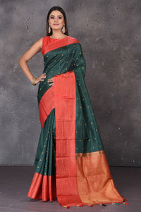 Buy beautiful dark green Gadhwal silk saree online in USA with red border and buta. Enrich your ethnic wardrobe with traditional Indian sarees, designer sarees. embroidered sarees, pure silk sarees, handwoven sarees, Kanchipuram sarees, Banarasi saris from Pure Elegance Indian saree store in USA.-full view