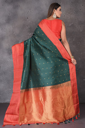 Buy beautiful dark green Gadhwal silk saree online in USA with red border and buta. Enrich your ethnic wardrobe with traditional Indian sarees, designer sarees. embroidered sarees, pure silk sarees, handwoven sarees, Kanchipuram sarees, Banarasi saris from Pure Elegance Indian saree store in USA.-back