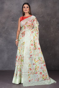 Shop beautiful mint green floral organza sari online in USA with embroidered border. Enrich your ethnic wardrobe with traditional Indian sarees, designer sarees. embroidered sarees, pure silk sarees, handwoven sarees, Kanchipuram sarees, Banarasi saris from Pure Elegance Indian saree store in USA.-full view