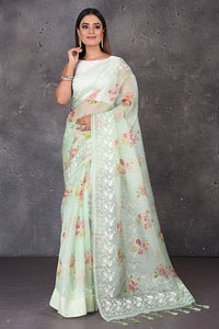 Buy stunning mint green floral organza sari online in USA with embroidered border. Enrich your ethnic wardrobe with traditional Indian sarees, designer sarees. embroidered sarees, pure silk sarees, handwoven sarees, Kanchipuram sarees, Banarasi saris from Pure Elegance Indian saree store in USA.-full view
