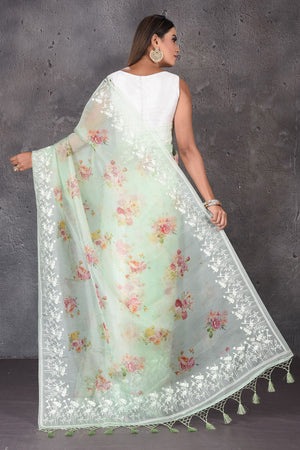 Buy stunning mint green floral organza sari online in USA with embroidered border. Enrich your ethnic wardrobe with traditional Indian sarees, designer sarees. embroidered sarees, pure silk sarees, handwoven sarees, Kanchipuram sarees, Banarasi saris from Pure Elegance Indian saree store in USA.-back