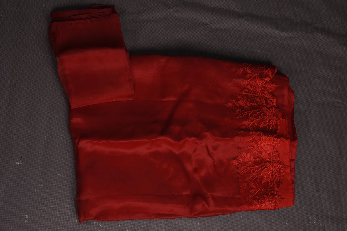Shop beautiful red organza saree online in USA with floral cut-work border. Keep your ethnic wardrobe up to date with latest designer sarees, pure silk sarees, handwoven sarees, tussar silk sarees, embroidered sarees, organza saris from Pure Elegance Indian fashion store in USA.-blouse