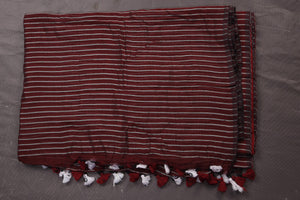 Buy stunning maroon striped handloom cotton saree online in USA. Keep your ethnic wardrobe up to date with latest designer sarees, pure silk sarees, handwoven sarees, tussar silk sarees, embroidered sarees, organza saris from Pure Elegance Indian fashion store in USA.-blouse