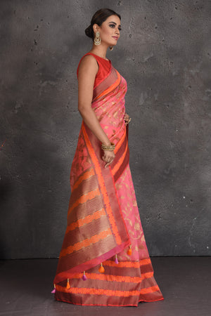 Shop beautiful pink fancy Kora saree online in USA with golden zari orange border. Keep your ethnic wardrobe up to date with latest designer sarees, pure silk sarees, handwoven sarees, tussar silk sarees, embroidered sarees, organza saris from Pure Elegance Indian fashion store in USA.-side