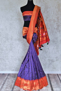 Buy stunning blue handloom silk Paithani saree online in USA with red zari border. Flaunt your sartorial choices on special occasions in stunning designer sarees, embroidered sarees, handloom sarees, Banarasi sarees, crepe sarees from Pure Elegance Indian fashion store in USA.-full view