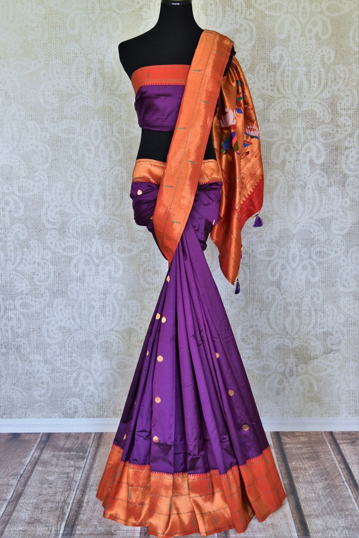 Buy stunning purple off-white handloom silk Paithani saree online in USA with red zari border. Flaunt your sartorial choices on special occasions in stunning designer sarees, embroidered sarees, handloom sarees, Banarasi sarees, crepe sarees from Pure Elegance Indian fashion store in USA.--full view