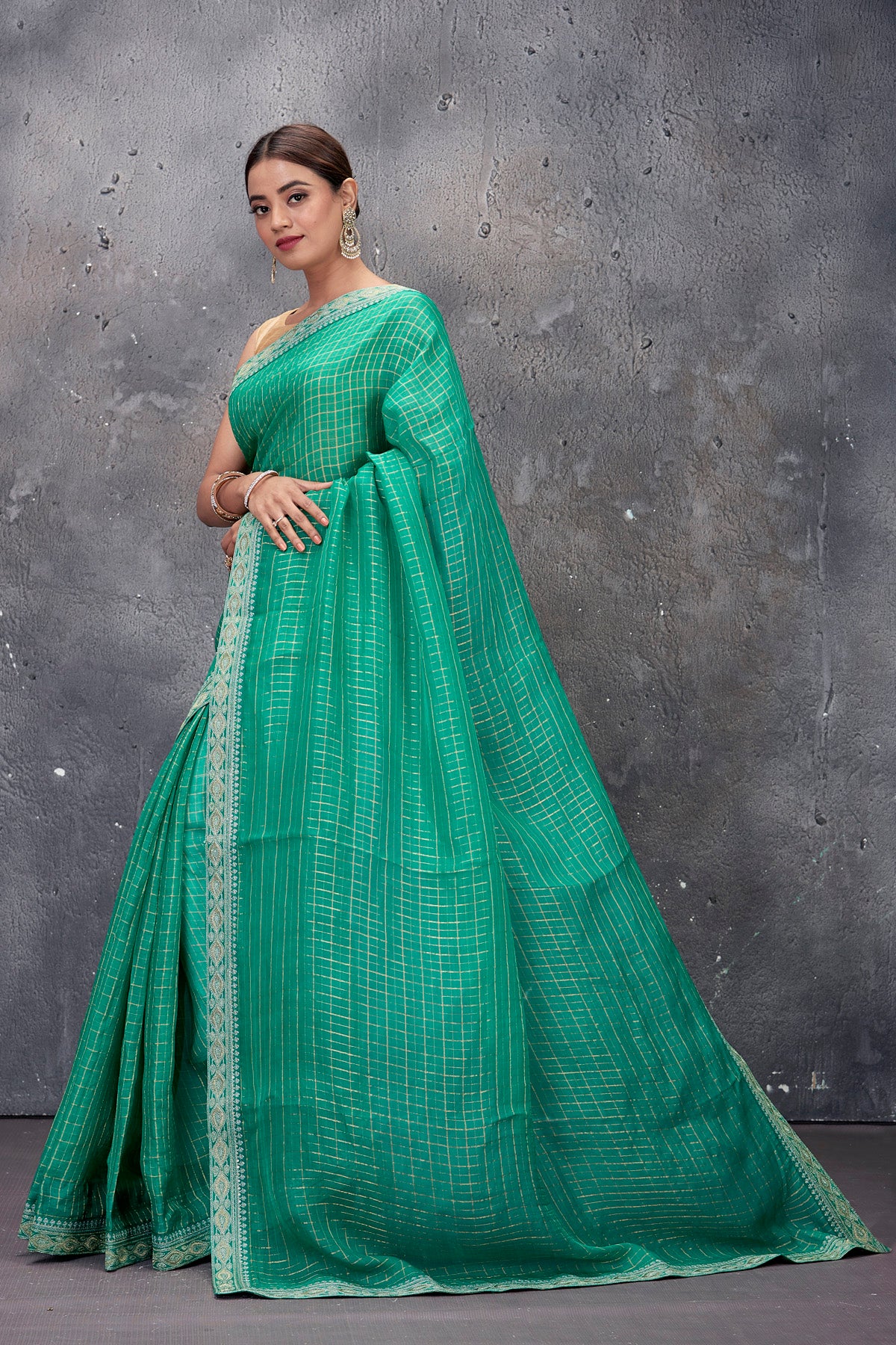 Shop stunning green designer saree online in USA with embroidered border and saree blouse. Keep your ethnic wardrobe up to date with latest designer saris, pure silk sarees, handwoven sarees, tussar silk sarees, embroidered saris from Pure Elegance Indian saree store in USA.-pallu