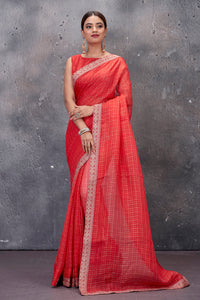 Shop beautiful red designer saree online in USA with embroidered border and saree blouse. Keep your ethnic wardrobe up to date with latest designer saris, pure silk sarees, handwoven sarees, tussar silk sarees, embroidered saris from Pure Elegance Indian saree store in USA.-full view
