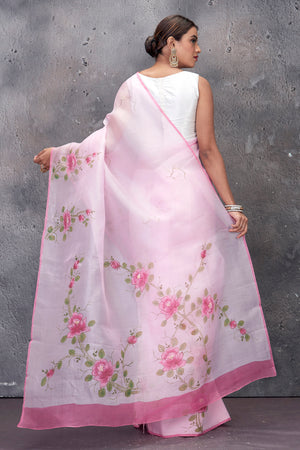 Shop stunning powder pink hand painted organza saree online in USA. Keep your ethnic wardrobe up to date with latest designer saris, pure silk sarees, handwoven sarees, tussar silk sarees, embroidered saris from Pure Elegance Indian saree store in USA.-back