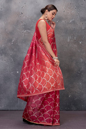 Shop stunning red foil print Kota sari online in USA. Keep your ethnic wardrobe up to date with latest designer saris, pure silk sarees, handwoven sarees, tussar silk sarees, embroidered saris from Pure Elegance Indian saree store in USA.-side