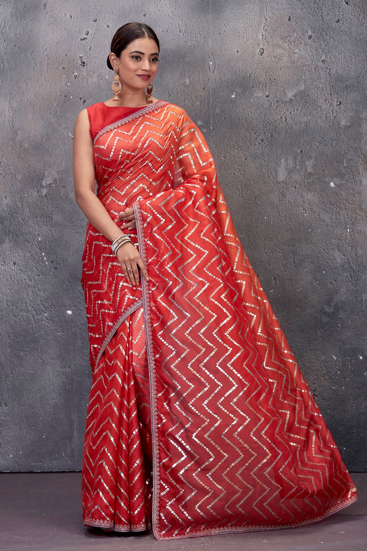 Shop stunning red chevron foil print Kota saree online in USA. Keep your ethnic wardrobe up to date with latest designer saris, pure silk sarees, handwoven sarees, tussar silk sarees, embroidered saris from Pure Elegance Indian saree store in USA.-full view