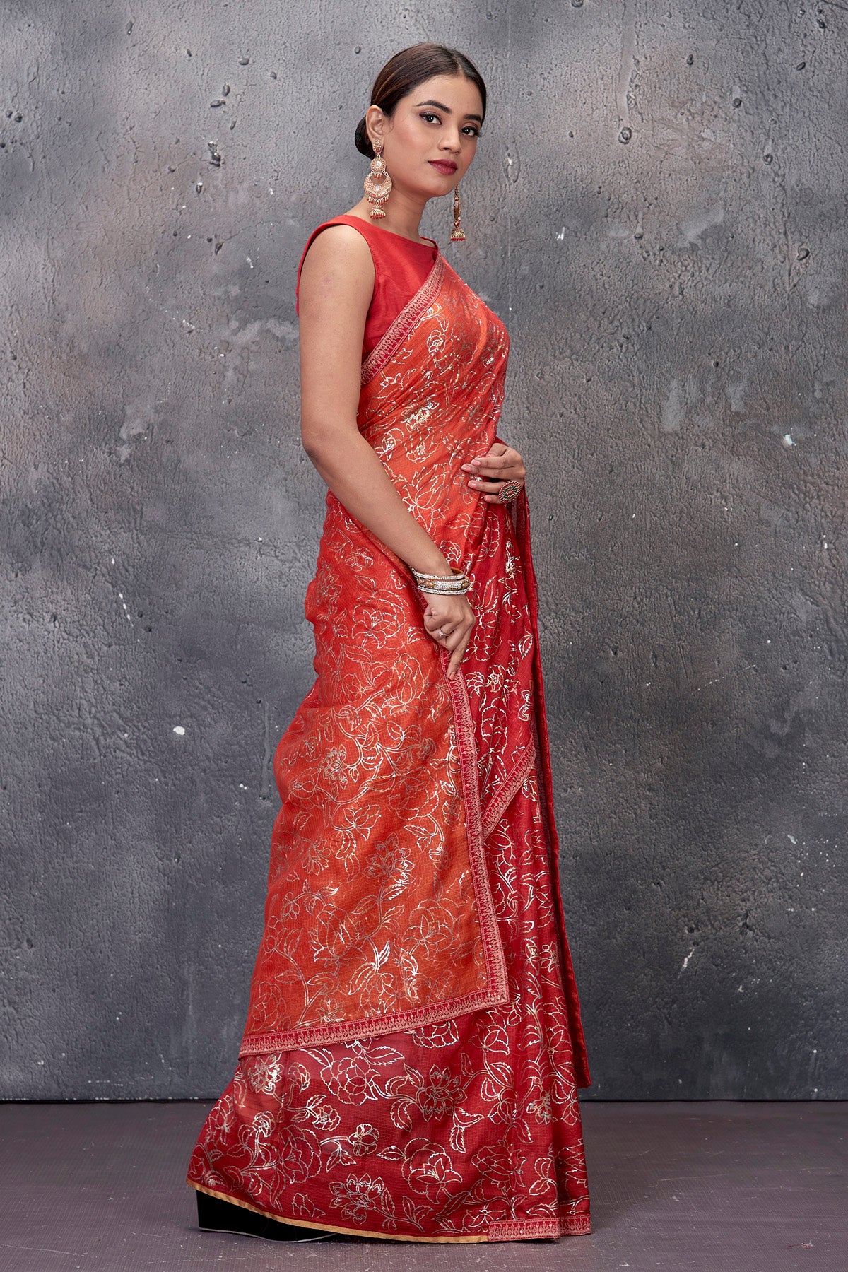 Buy stunning red and peach foil print Kota saree online in USA. Keep your ethnic wardrobe up to date with latest designer saris, pure silk sarees, handwoven sarees, tussar silk sarees, embroidered saris from Pure Elegance Indian saree store in USA.-side