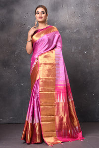 Buy stunning pink handloom Kanjivaram saree online in USA with golden zari border. Keep your ethnic wardrobe up to date with latest designer sarees, pure silk sarees, handwoven sarees, tussar silk sarees, embroidered sarees, chiffon saris from Pure Elegance Indian saree store in USA.-full view