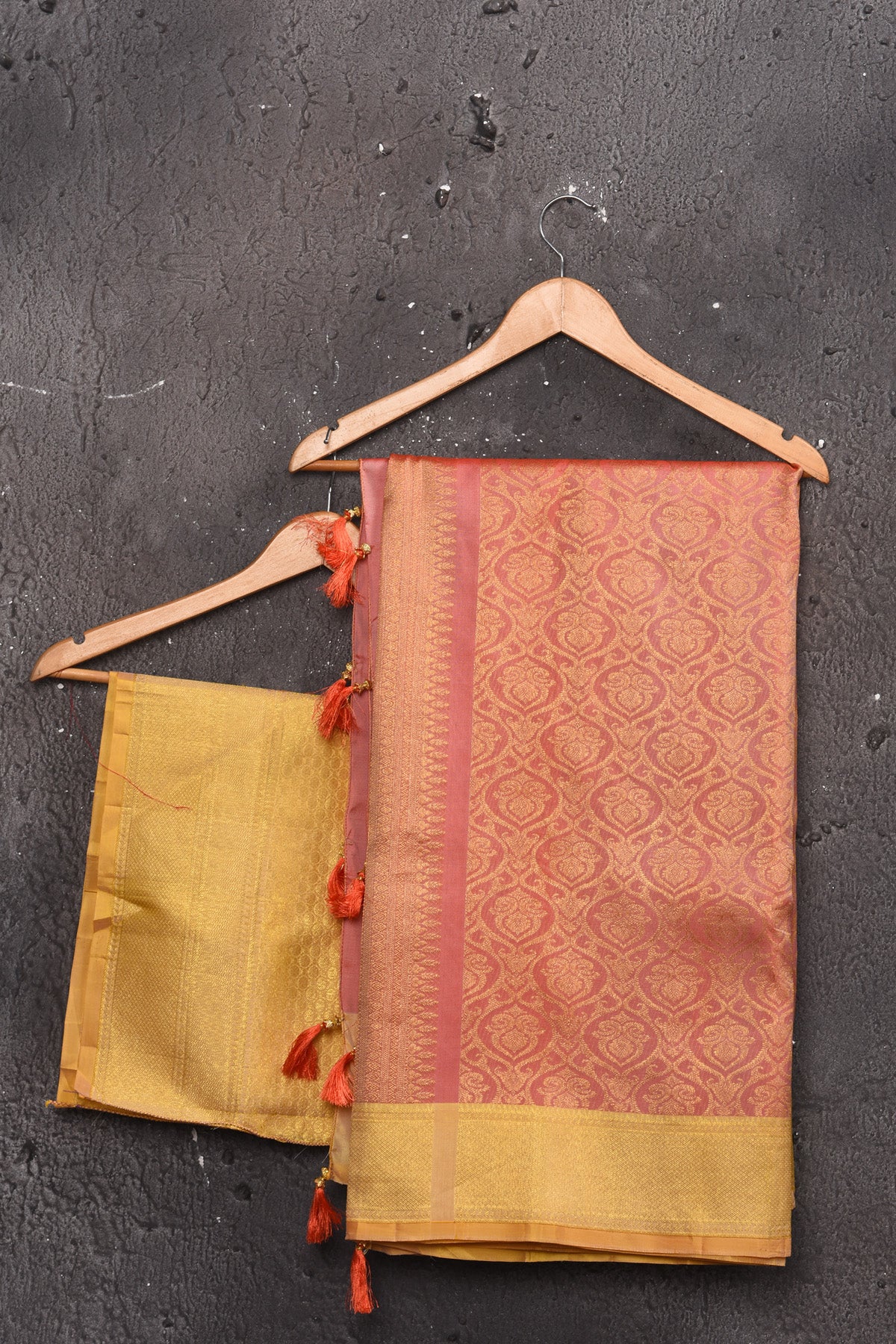 Buy gorgeous peach handloom Kanjivaram sari online in USA with yellow zari border. Keep your ethnic wardrobe up to date with latest designer sarees, pure silk sarees, handwoven sarees, tussar silk sarees, embroidered sarees, chiffon saris from Pure Elegance Indian saree store in USA.-blouse