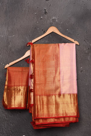 Buy gorgeous light pink handloom Kanjivaram sari online in USA with red zari border. Keep your ethnic wardrobe up to date with latest designer sarees, pure silk sarees, handwoven sarees, tussar silk sarees, embroidered sarees, chiffon saris from Pure Elegance Indian saree store in USA.-blouse